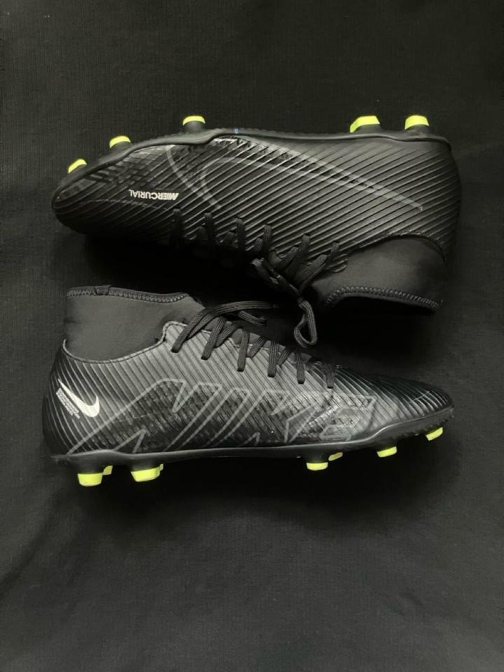 Nike Black Soccer Cleats with Neon Yellow Stud Accents